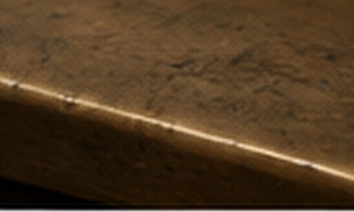 Aged brass, photographed at macro scale